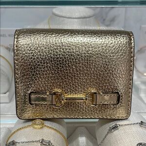 MICHAEL KORS
Carson Small Metallic Pebbled Leather Wallet
Pale Gold 
NWT